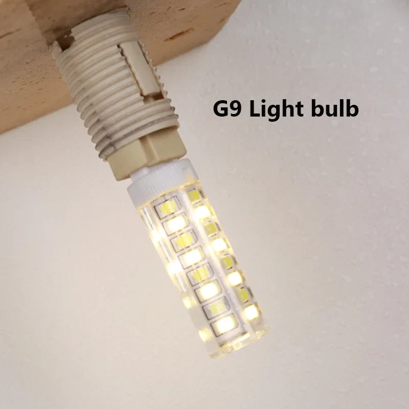 Globe Wall Light | Faux Travertine & Frosted Glass | 6 in Height