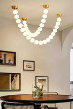 Pendant Lamp | Matte Glass Pearls & Brass Connectors