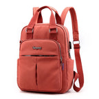 Travel Backpack Purse | USB Charging Port & Waterproof Nylon