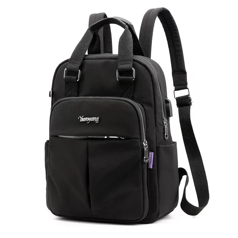 Travel Backpack Purse | USB Charging Port & Waterproof Nylon