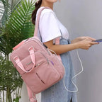 Travel Backpack Purse | USB Charging Port & Waterproof Nylon