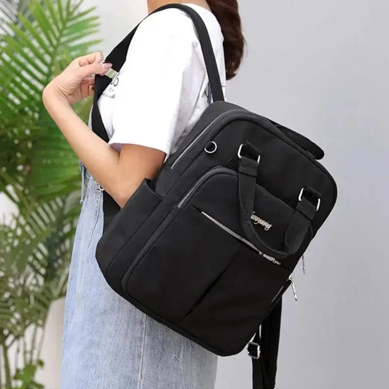 Travel Backpack Purse | USB Charging Port & Waterproof Nylon