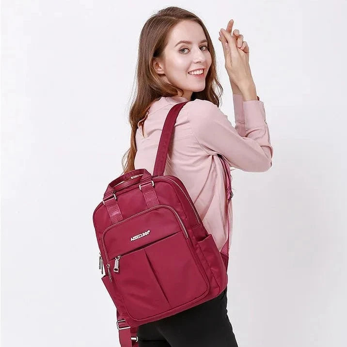 Travel Backpack Purse | USB Charging Port & Waterproof Nylon