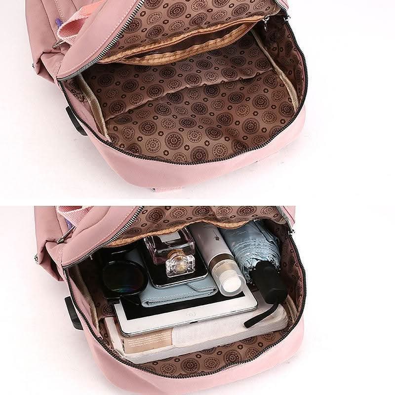 Travel Backpack Purse | USB Charging Port & Waterproof Nylon