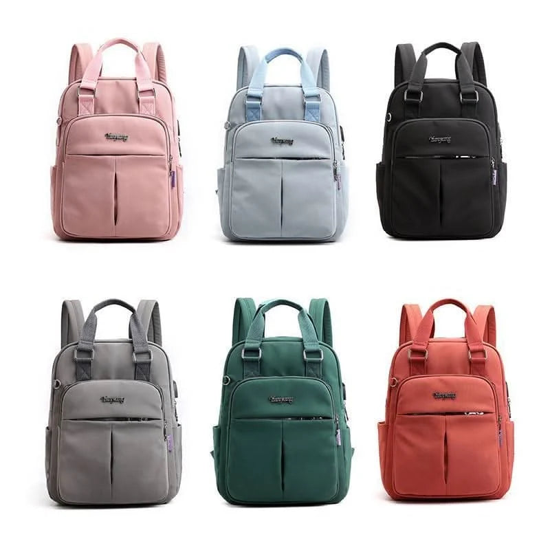 Travel Backpack Purse | USB Charging Port & Waterproof Nylon